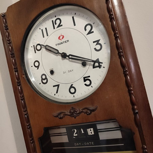 Frontier 31 Day mechanical wooden wall clock with pendulum and calendar like new