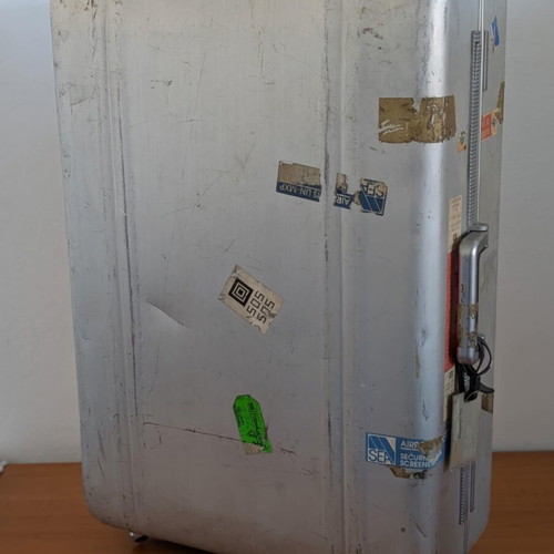 Zero Halliburton metal travel suitcases used, silver, pair