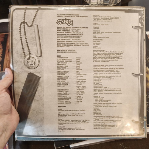Grease vinyl records used, John Travolta and Olivia Newton-John