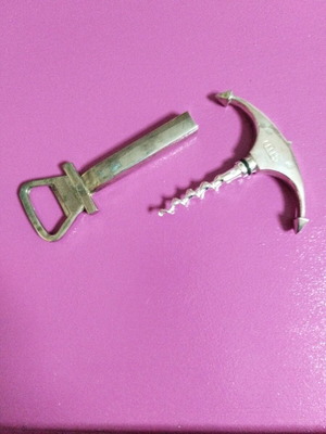 Silver bottle opener and corkscrew like new