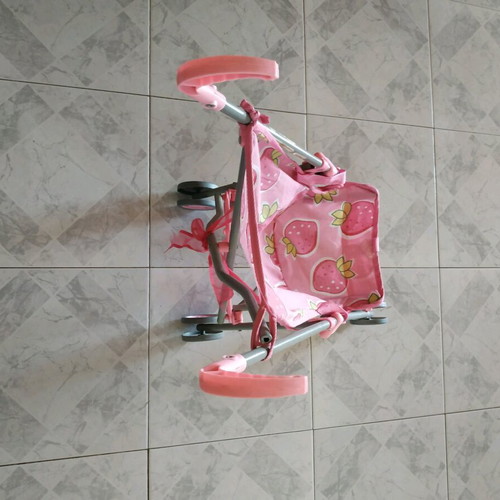 Doll stroller like new with 4 wheels