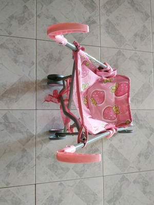 Doll stroller like new with 4 wheels