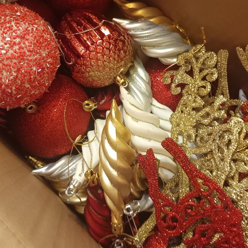 Christmas ornaments like new, box with balls and branches in gold red silver white tones