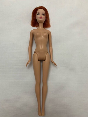 Barbie doll used with cut hair and different body