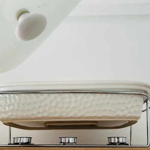 Baking dish with lid and candle holder for temperature maintenance
