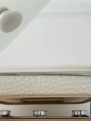 Baking dish with lid and candle holder for temperature maintenance