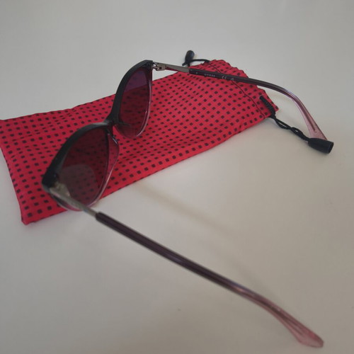 Guess children's sunglasses with pink frame and purple lenses