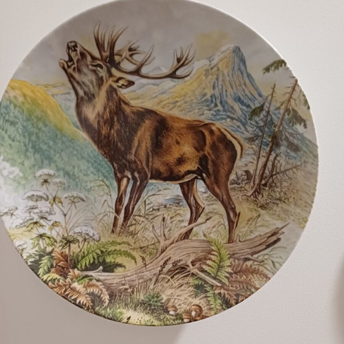 Vintage porcelain plate by Kaiser with deer illustration used