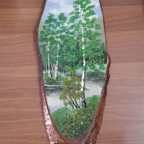 Petroglyph on linden wood like new with precious stones
