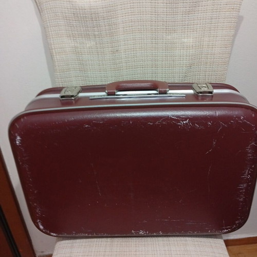 Vintage travel suitcase used, burgundy leather exterior