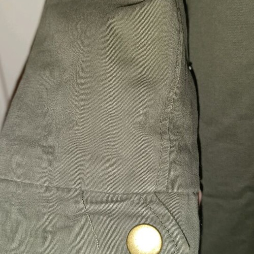 Khaki parka like new with red fur lining, size M