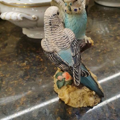 Figurine of two beautiful parrots on a branch like new