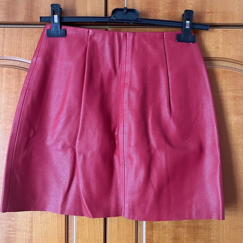 Mini leather-look asymmetrical skirt with zipper red, size XS
