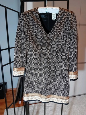 Manolo dress like new, mini, black with gold details