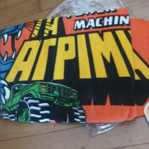 Advertising towel and flip-flops from El Greco 80s