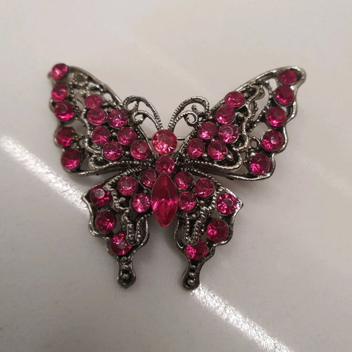 Butterfly pin like new
