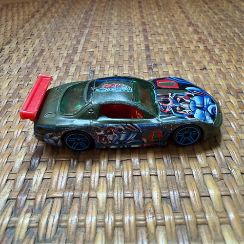 Vintage Hot Wheels 1998 Olds Aurora GTS-1 used with Transformer graphics and Japanese writing
