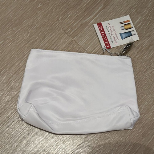 Clarins white bag with zipper new