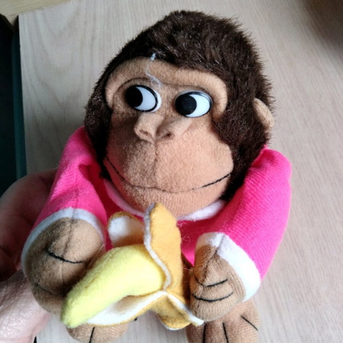 Plush monkey with banana like new