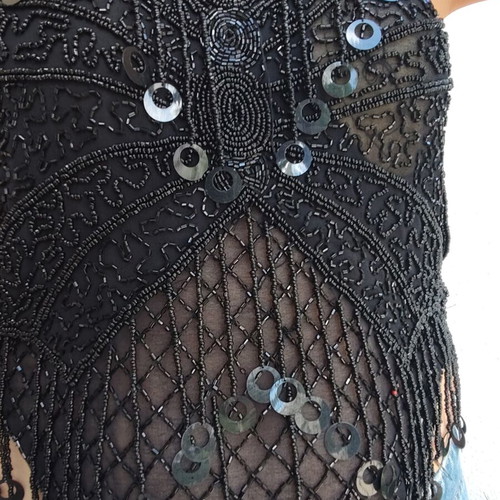Top with birds and beads like new, black, sizes S and M