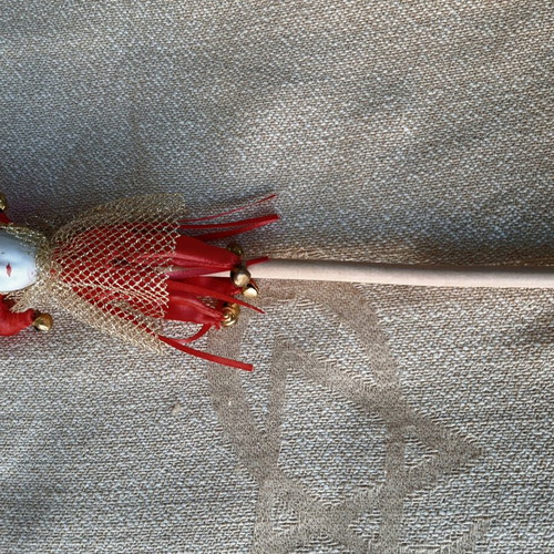 Decorative Harlequin figure on stick like new, red costume