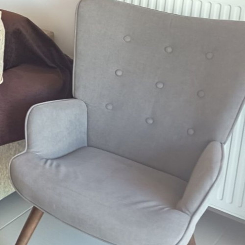Armchair with footrest, needs minor leg repair