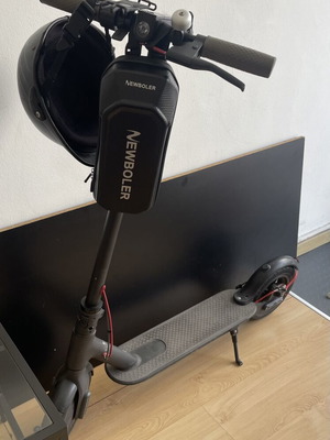 Xiaomi M365 electric scooter with custom firmware and 10-inch wheels