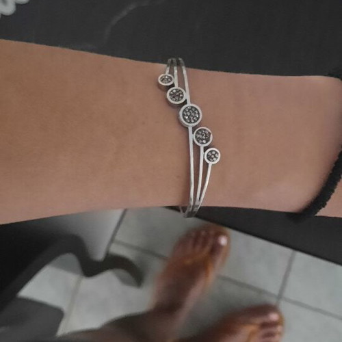 Rigide Stainless Steel bracelet like new with black and grey zirconia circles