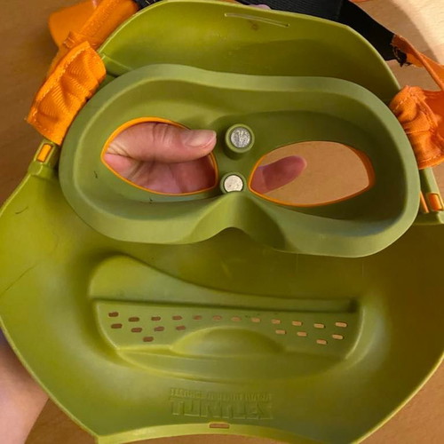Ninja Turtle mask and weapons used