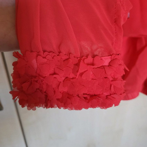 Coral sheer blouse like new with floral sleeve details