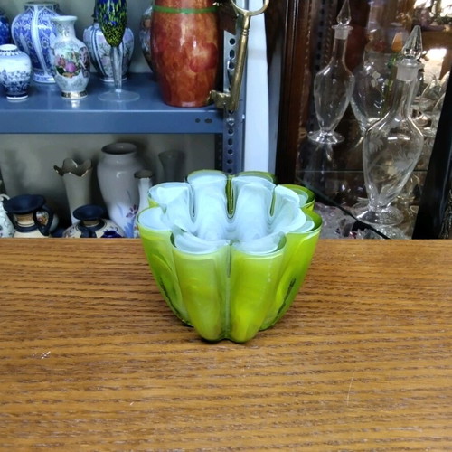 Candlestick made of solid glass in light green with veins like new