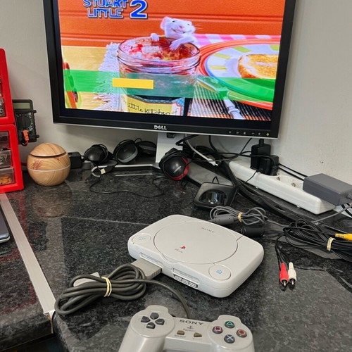 Sony PSone Slim SCPH-102 like new with original controller, power adapter, AV and Stuart Little 2