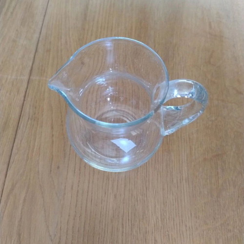 Small glass jug like new, height 10cm