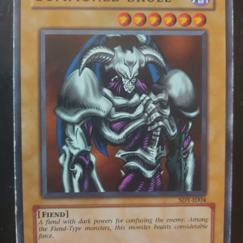 Summoned Skull Yugioh card used, authentic