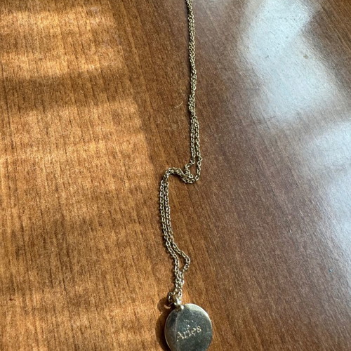 Gold necklace used with Aries constellation Stradivarius