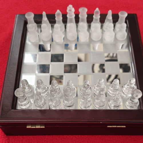 Vintage glass chess set used with wooden case and mirror board