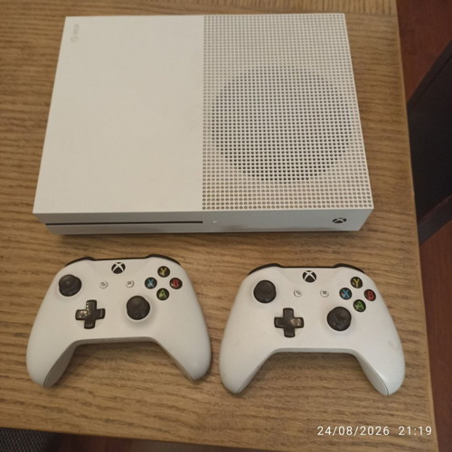 Xbox One S console with two controllers