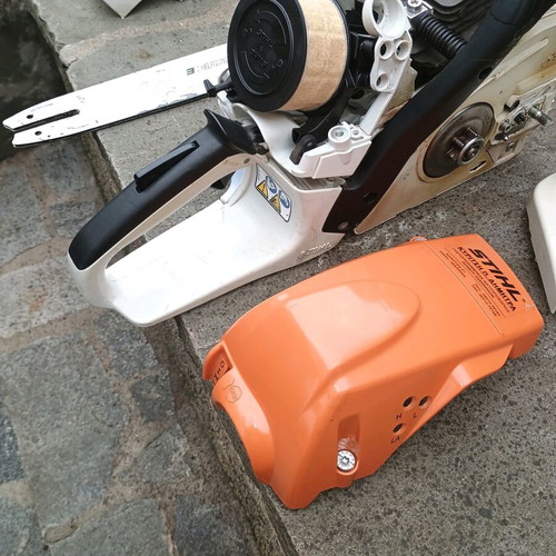 Stihl MS 251 chainsaw like new with three chains
