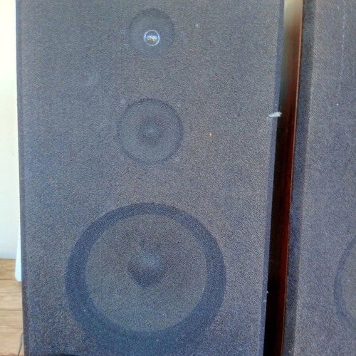 Floor-standing speakers used with wooden frame