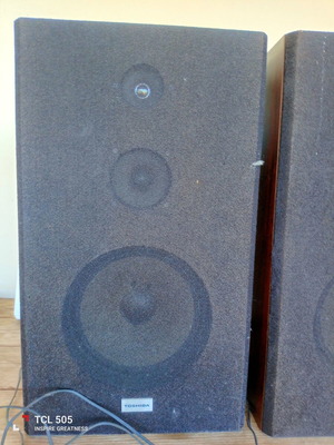 Floor-standing speakers used with wooden frame