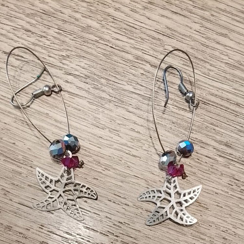 Earrings star design silver like new