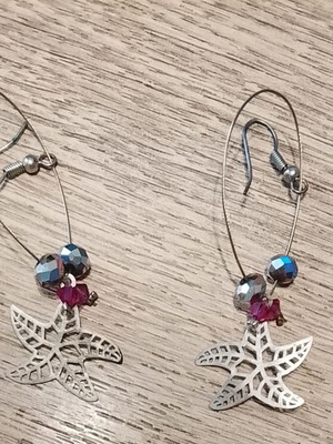 Earrings star design silver like new