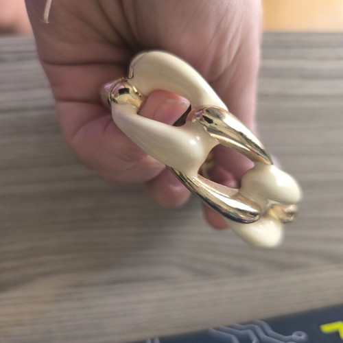 Vintage chunky chain-link clamper bracelet with cream enamel and gold details, like new