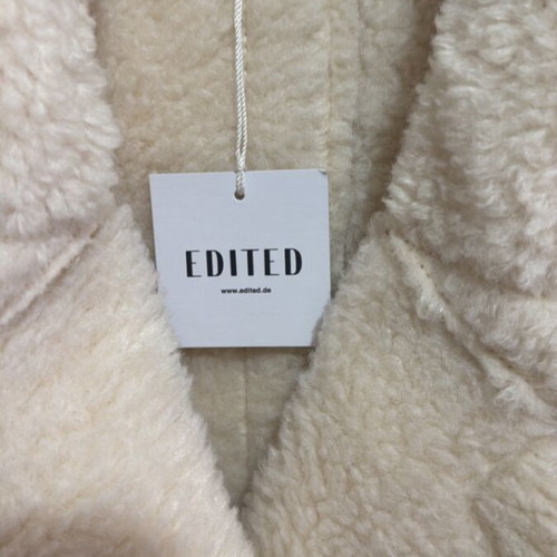 Edited beige coat with fur lining, new with tags