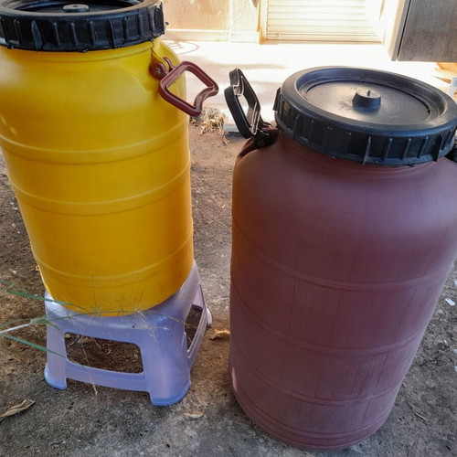 Plastic barrels for food storage, 35L yellow and 60L orange