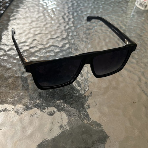 Sunglasses used only once, black