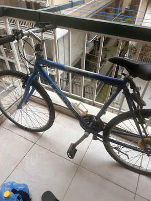 Simple city bicycle used, blue, men's, with gears