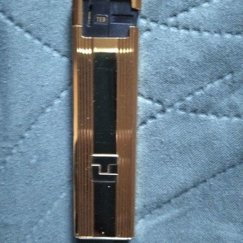Ted Lapidus lighter used, gold plated