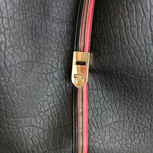Women's shoulder bag used, black with red details