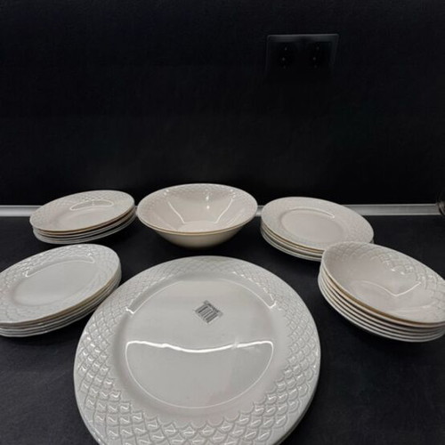 Porcelain dinnerware set with embossed design, like new